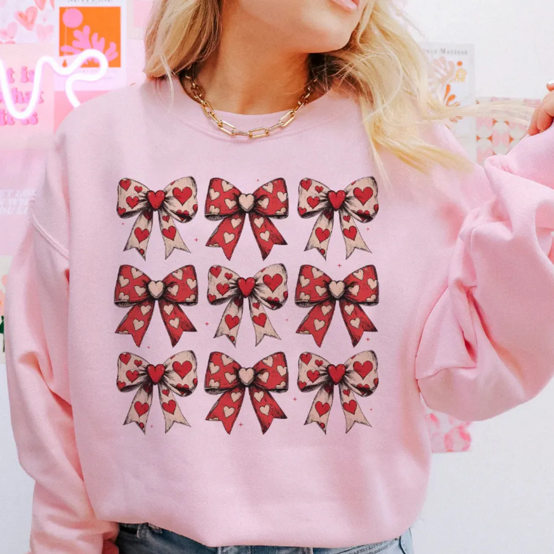 Online Exclusive | On Cloud 9 Assortment of Bows with Hearts Graphic Sweatshirt in Pink